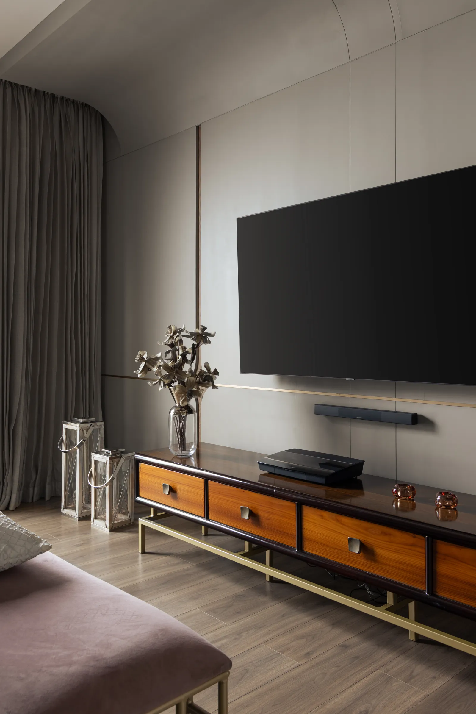 TV wall with walnut and brass console — Seema Katta Svasa